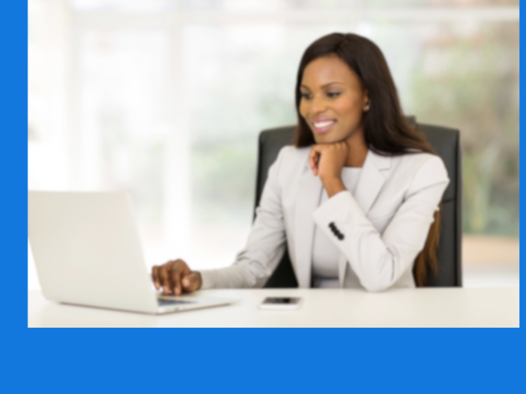 Black Woman Business Manager Setting at Desk with Laptop Open Working.